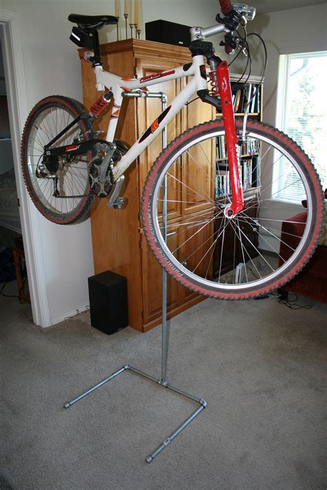 2 saw horses doing the same thing would be better, but I'd like smaller, not in the way so much, and with hooks supporting the <b>bike</b> under the rear forks. . Diy bike repair stand